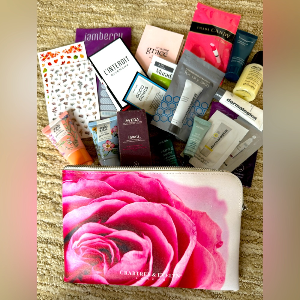 Cosmetic bag ; loaded with skin hair fragrance products.